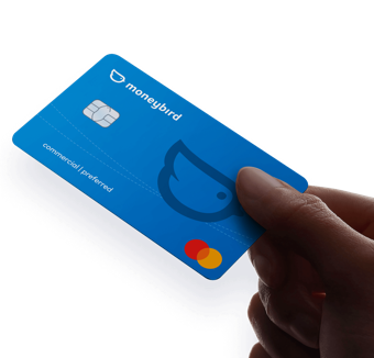 A hand holding a credit cardDescription automatically generated